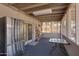 Screened-in porch with stainless steel refrigerator and outdoor access at 616 W Toledo St, Chandler, AZ 85225