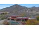 Modern home with solar panels and a private pool area at 6520 E El Sendero Rd, Carefree, AZ 85377