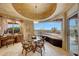 Charming breakfast nook with scenic views and custom cabinetry at 6520 E El Sendero Rd, Carefree, AZ 85377