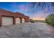 Three-car garage with ample parking space at 6520 E El Sendero Rd, Carefree, AZ 85377