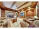 Relaxing Gathering room with access to the patio and built-ins at 6520 E El Sendero Rd, Carefree, AZ 85377