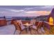 Outdoor patio with built-in grill and seating area at 6520 E El Sendero Rd, Carefree, AZ 85377