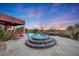 Stunning pool and spa with mountain views and beautiful sunset at 6520 E El Sendero Rd, Carefree, AZ 85377