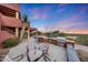 Inviting pool and spa with outdoor kitchen at 6520 E El Sendero Rd, Carefree, AZ 85377