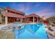 Resort-style pool and spa with waterfall feature at 6520 E El Sendero Rd, Carefree, AZ 85377