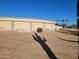 Distinctive curved home exterior with desert landscaping at 6726 E Shea Blvd, Scottsdale, AZ 85254