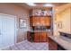 Kitchen features wine storage and wood cabinets at 7034 E Soaring Eagle Way, Scottsdale, AZ 85266