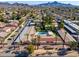 Aerial view of an apartment complex with a pool and surrounding area at 8241 N Central Ave # 11, Phoenix, AZ 85020