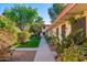 Building exterior showing a courtyard with a grassy area and walkways at 8241 N Central Ave # 11, Phoenix, AZ 85020