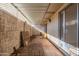 Covered patio with brick flooring and large potted plant at 8241 N Central Ave # 11, Phoenix, AZ 85020