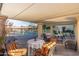 Community pool with covered seating area and tables at 8241 N Central Ave # 11, Phoenix, AZ 85020