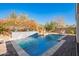 Inviting pool with a tiled water feature and spacious deck at 918 W Yellowstone Way, Chandler, AZ 85248