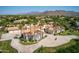 Luxury estate home with expansive driveway and mountain views at 10754 E Laurel Ln, Scottsdale, AZ 85259