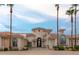 Stunning curb appeal with palm trees and circular driveway at 10754 E Laurel Ln, Scottsdale, AZ 85259