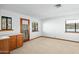 Bedroom with wood cabinets and access to balcony at 11426 E Cottontail Rd, Cave Creek, AZ 85331