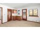 Bedroom with wood cabinets and access to balcony at 11426 E Cottontail Rd, Cave Creek, AZ 85331