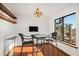 Charming breakfast nook with a small table and chairs, offering a view at 11426 E Cottontail Rd, Cave Creek, AZ 85331