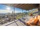 Covered deck with mountain views and comfortable seating at 11426 E Cottontail Rd, Cave Creek, AZ 85331