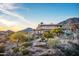 House exterior showcasing desert landscaping and mountain backdrop at 11426 E Cottontail Rd, Cave Creek, AZ 85331