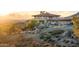 Stunning home exterior with mountain views and a long driveway at 11426 E Cottontail Rd, Cave Creek, AZ 85331