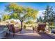 Patio with two chairs and mountain views at 11426 E Cottontail Rd, Cave Creek, AZ 85331