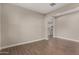 Dining room with tile floor and view into kitchen at 11555 W Marguerite Ave, Avondale, AZ 85323