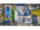 Aerial view of a home with solar panels and a pool at 12528 N 78Th St, Scottsdale, AZ 85260