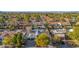 Aerial view of a house with a pool and solar panels in a residential neighborhood at 12528 N 78Th St, Scottsdale, AZ 85260