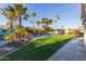 Landscaped backyard with pool, putting green, and pickleball court at 12528 N 78Th St, Scottsdale, AZ 85260