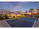 Home with a large backyard, including a covered patio, putting green, and a pickleball court at 12528 N 78Th St, Scottsdale, AZ 85260