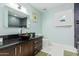Bathroom with modern vanity, vessel sink, and shower at 12528 N 78Th St, Scottsdale, AZ 85260