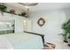 Bedroom with a king-size bed and built-in shelving at 12528 N 78Th St, Scottsdale, AZ 85260