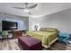 Spacious bedroom with large bed, desk, and ample natural light at 12528 N 78Th St, Scottsdale, AZ 85260