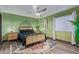 Charming bedroom with a queen bed and green walls at 12528 N 78Th St, Scottsdale, AZ 85260