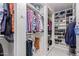 Large walk-in closet with ample shelving and hanging space at 12528 N 78Th St, Scottsdale, AZ 85260