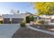 Stunning curb appeal with a three-car garage at 12528 N 78Th St, Scottsdale, AZ 85260