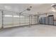 Large garage with ample storage cabinets and overhead storage at 12528 N 78Th St, Scottsdale, AZ 85260