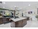 Modern kitchen with large island, stainless steel appliances, and ample counter space at 12528 N 78Th St, Scottsdale, AZ 85260