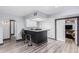 Modern kitchenette with bar seating and dark countertops at 12528 N 78Th St, Scottsdale, AZ 85260