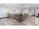 Open living room featuring a sectional sofa and wood floors at 12528 N 78Th St, Scottsdale, AZ 85260