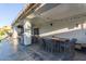 Outdoor patio with seating area, dining table, and string lights at 12528 N 78Th St, Scottsdale, AZ 85260
