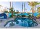 Freeform swimming pool with a relaxing patio area at 12528 N 78Th St, Scottsdale, AZ 85260