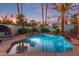 Inviting freeform pool surrounded by colorful landscaping at 12528 N 78Th St, Scottsdale, AZ 85260