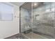 Sleek walk-in shower with gray tile and built-in bench at 12528 N 78Th St, Scottsdale, AZ 85260
