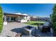 Relaxing backyard oasis with fire pit and covered patio at 12657 W Myrtle Ave, Glendale, AZ 85307