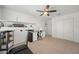 Home office with a treadmill, desk and double door closet at 12657 W Myrtle Ave, Glendale, AZ 85307