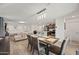 Open concept dining room with table and chairs at 12657 W Myrtle Ave, Glendale, AZ 85307