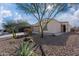 Single-story house with desert landscaping and two-car garage at 12657 W Myrtle Ave, Glendale, AZ 85307