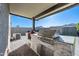 Outdoor kitchen with stainless steel appliances and stone countertops at 12657 W Myrtle Ave, Glendale, AZ 85307