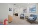 Relaxing sitting area with two armchairs and modern artwork at 12657 W Myrtle Ave, Glendale, AZ 85307